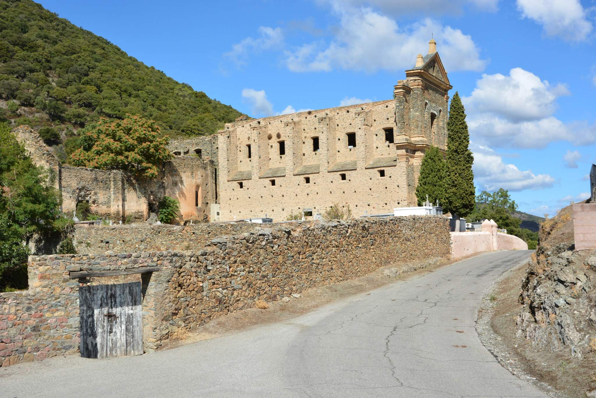 Corsican village and church on a mountain road