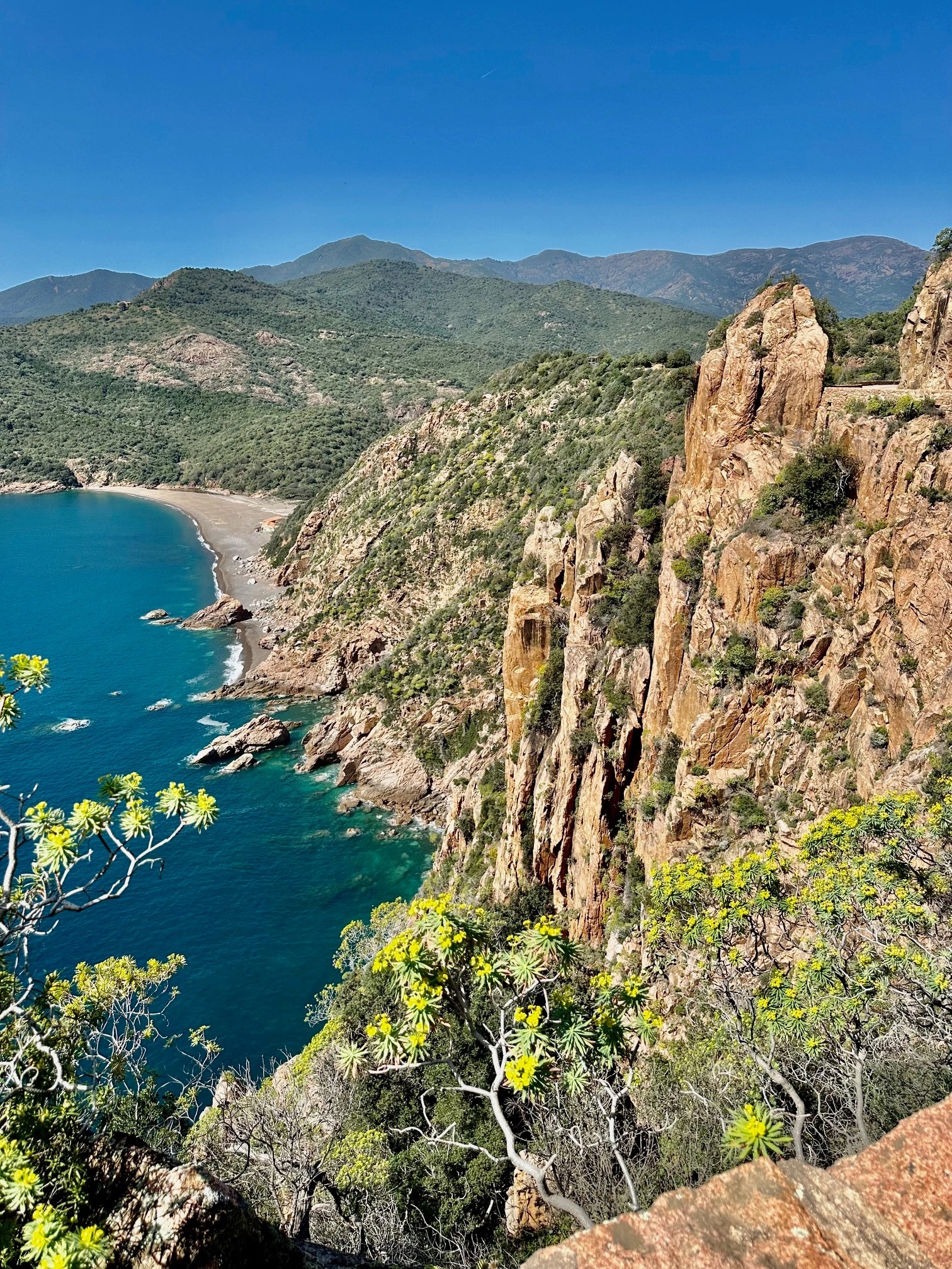 coastal landscape where ochre cliffs meet the sea